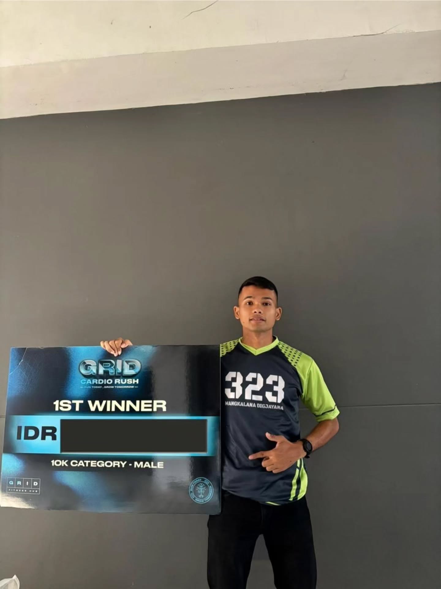 Praka Hendrik Nainggolan Juara 1 GRID RUN 2026, Harumkan Nama Yonif 323  Kostrad